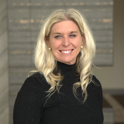 Girl smiling having blonde hairs