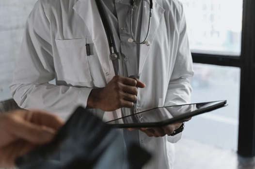 doctor working on tablet